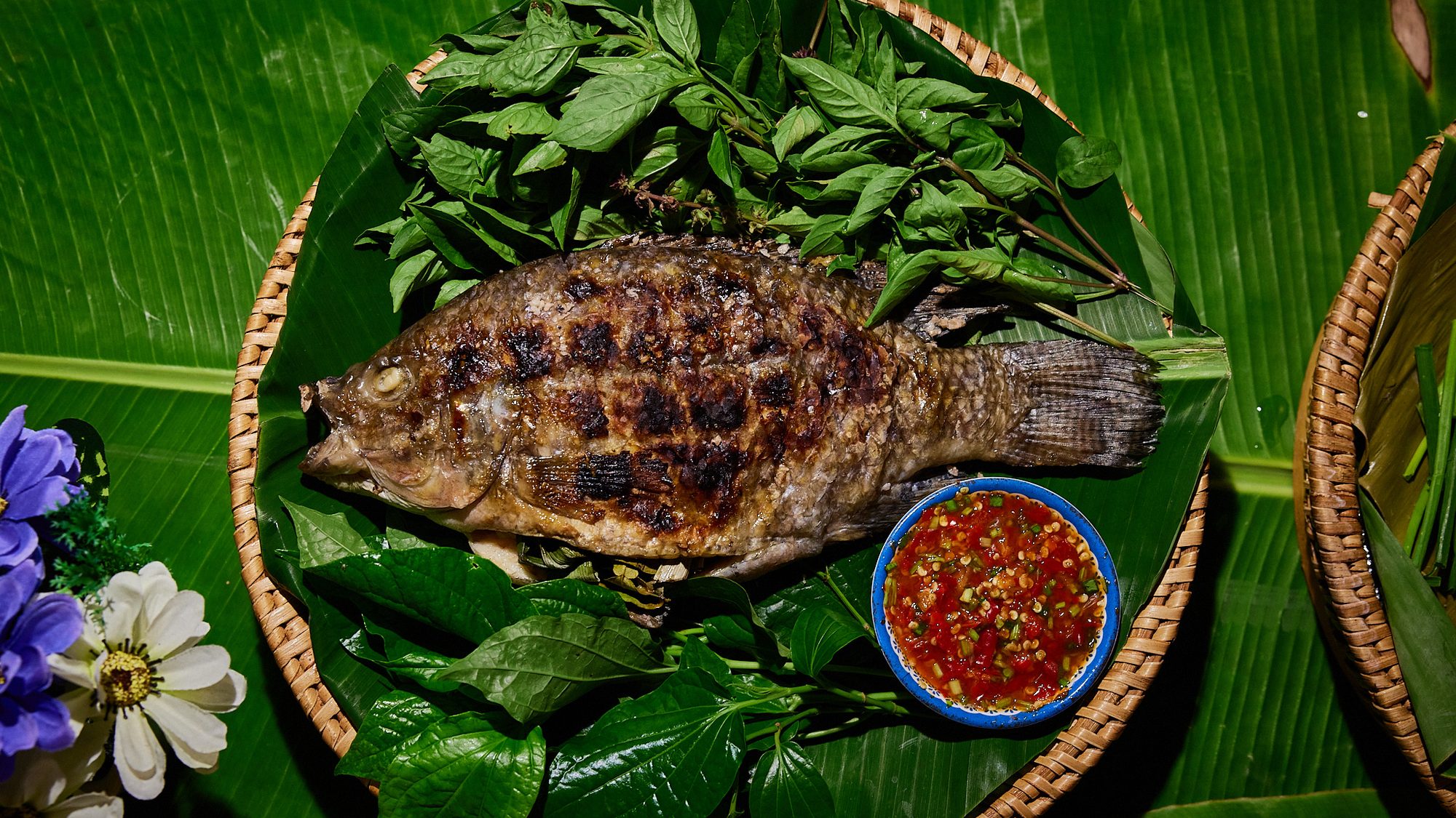 Whole fish, charred and served