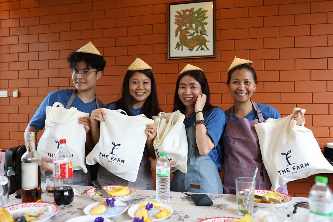 A Thailand-based company team at The Farm